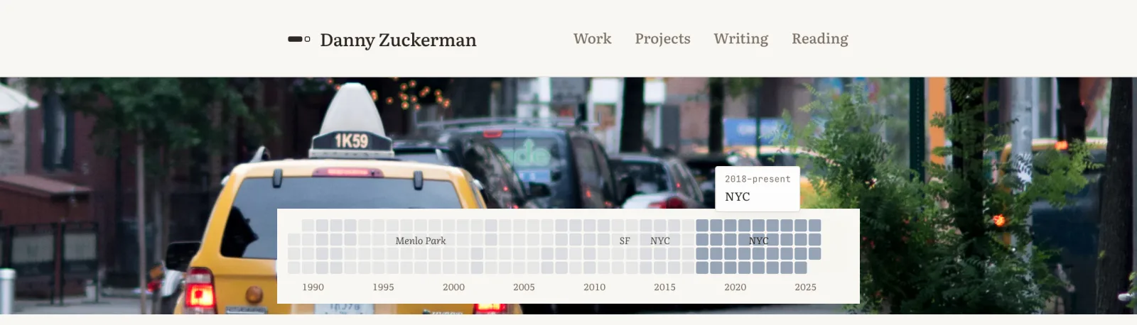 Round one of the home page: a street photo behind the life grid, with a floating card over the middle of the photo